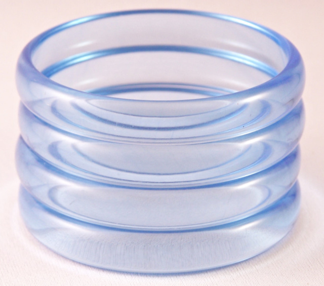 LG59 set four 60s transparent blue lucite bangle bracelets